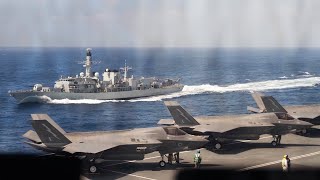 The aircraft carrier and her escorts