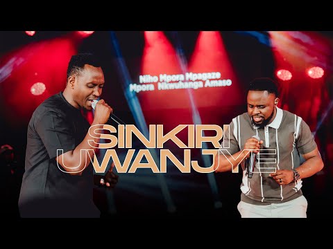 Felix N. Dume and Bosco Nshuti