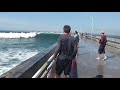 Big wave wets tourist funny