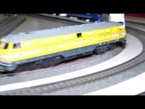 23. Stummi-Treff WN,  12 - V 320 001 (Brawa 41305), Wiebe Gleisbautechnik mit RoLa