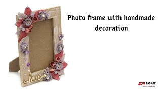 Photo frame with handmade decoration 