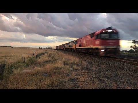 NR109, NR84, NR105 mixed freighter passing Wallan crossing (Ghan leading and Albury 3 car Vlocity