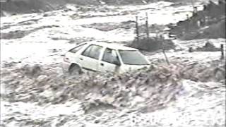 preview picture of video 'Turn Around Don't Drown!  Car washed away by Flash Flood - June 1999'