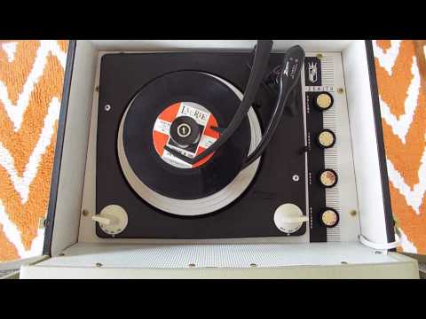 Zenith automatic, stereo record player playing a stack of 45 RPM records