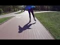Young Woman Skates Rollers Fast In Summer Dressed In Blue Jacket And Black Leggins She Is Beautiful
