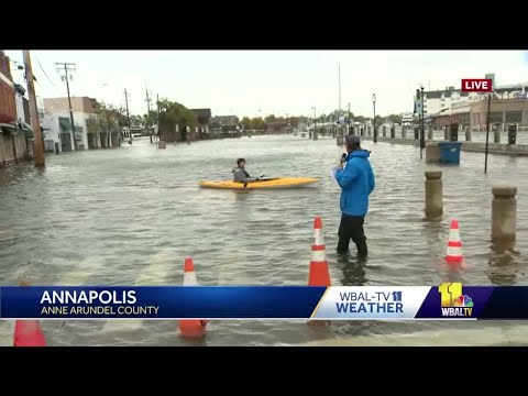 Kayakers paddle through flooding on Annapolis Main Street