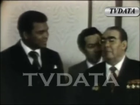 1978 USSR Muhammad Ali boxing champion in Soviet Russia kissing Brezhnev in Moscow Red Squire TVDATA