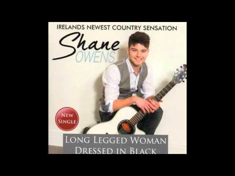 Shane Owens   Long leged woman dressed in black