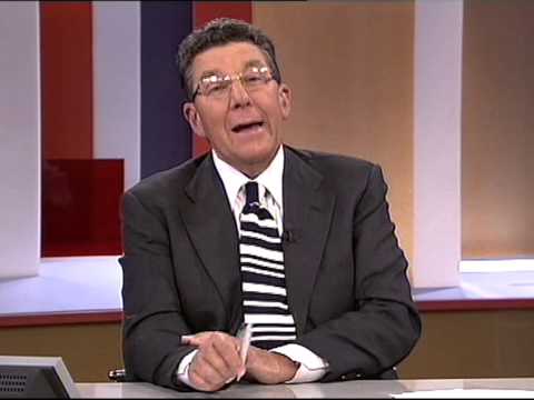 Paul Holmes - scans barcode tie with phone handset