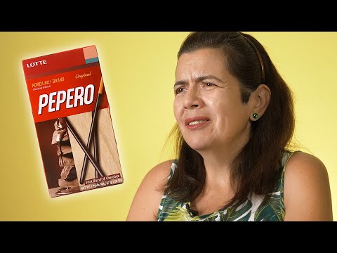Korean convenience store snack aisle showing rows of colorful Korean chip and snack packages