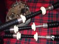 Rebel Piper With Scottish Bagpipes And Virtual Band