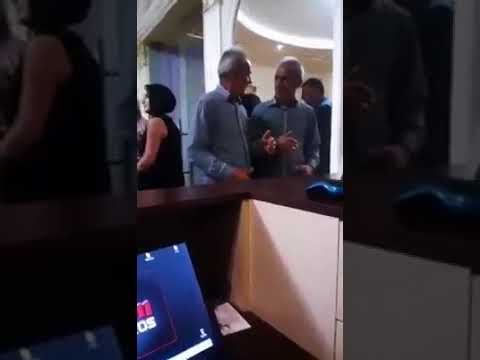 Drunk man raised voice conversation with his own mirror reflection