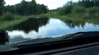 preview picture of video 'Scary driving down road with water over truck bumper flash flood North of Duluth 6-21-2012'