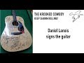 Daniel Lanois signing the Shawn Brush Foundation Guitar - Nov 1 2018