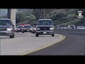 Suspects throw money from truck during police chase on San Diego freeway in 2009