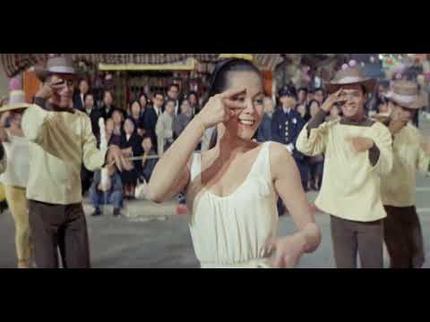 Trailer moment: Grant Avenue parade float with Linda Low performing to the crowd