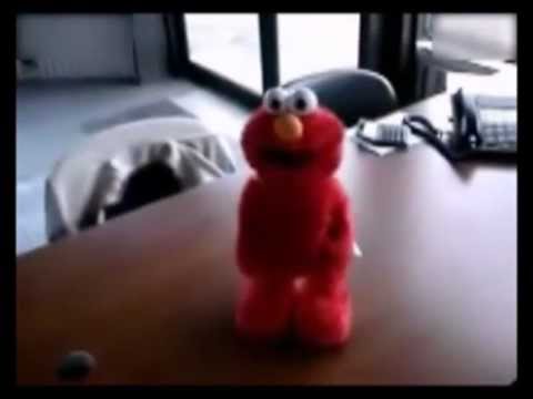 Epic toy Tickle Me Elmo laughing out loud as a  demon
