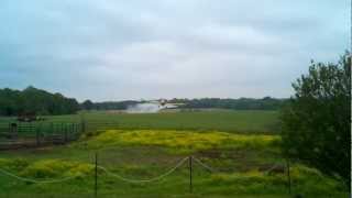 AT 502 spraying wheat.