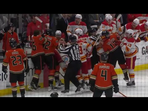 Trevor Zegras cross-checks Matthew Tkachuk  |  Calgary Flames vs Anaheim Ducks Bench Scrum 12/03/21