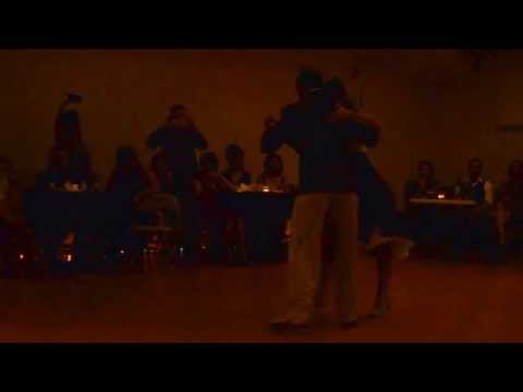  Jesica Arfenoni  and  Maximiliano Cristiani  are  dancing  to  the  tango  "  Café Domínguez  "  by  Ángel D'Agostino