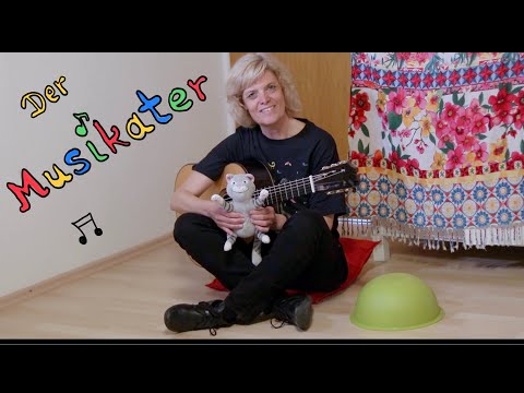 Der Musikater, Text Ulrike Schrott, Musik Rudolf Nykrin Gitarre, Gesang Monika Beuren