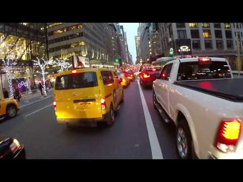 NYC Cycling 5th Avenue from 59th Street to Washington Square Park during the Holidays 2017 (Raw)