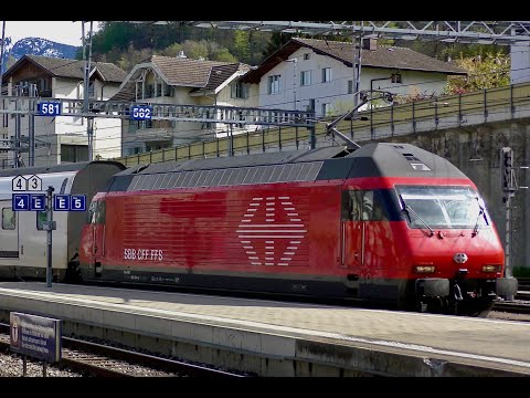 SBB CFF FFS train to Basel SBB via Thun & Bern arrives as Spiez station, Switzerland