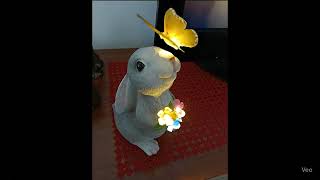 Butterfly fly away from bunny statue Davide Spagocci ai art