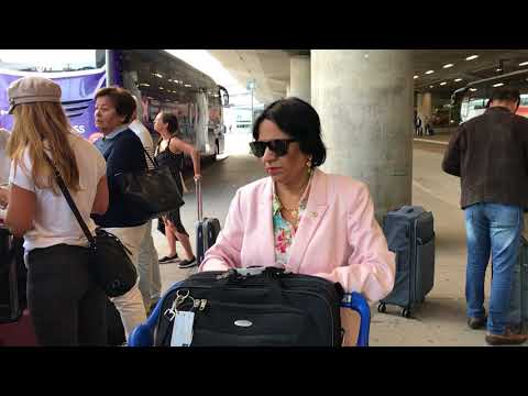 Aruna & Hari Sharma at Arlanda T5 Flygbus 801 station after arrival from Beijing, China Aug 15, 2+18