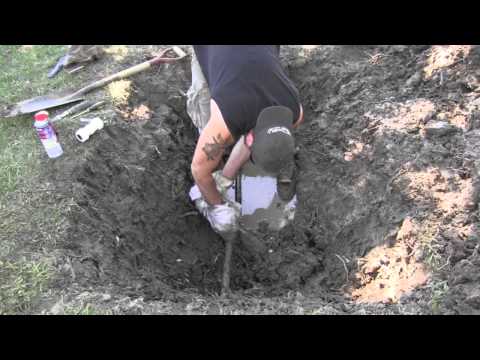 Repairing a main water line with a compression coupler