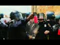 CNN reporter pepper-sprayed during protest - YouTube