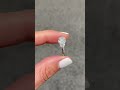 1.80-carat round trilogy engagement ring with 0.30-carat half moon on each side