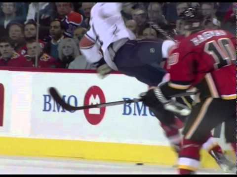 Mark Giordano hipchecks Taylor Hall