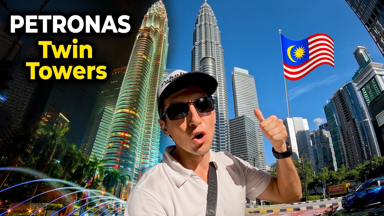 Join a traveler as they uncover the splendor of the Petronas Twin Towers in this gripping video.