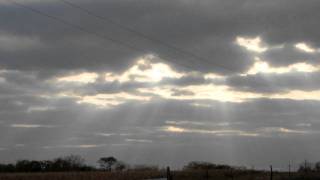 preview picture of video 'Sunbeams breaking through clouds onto cropland Plattsburg MO 3'