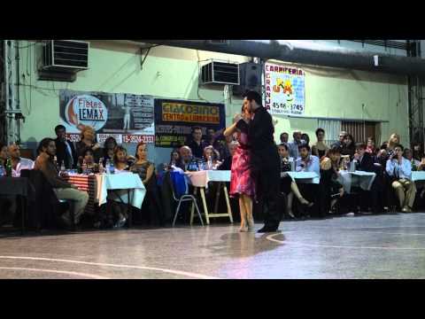  Javier Rodriguez  and  Noelia Barsi  are  dancing  to  "  El Ciruja  "  by  Carlos di Sarli