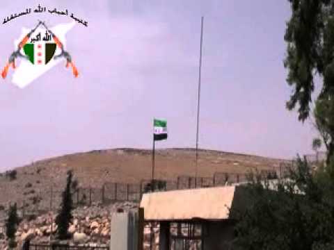 لقطات ترصد  تواجد وتمركز عناصر كتيبة أحباب الله المستقلة في معبر باب الهوى الحدودي في ريف ادلب