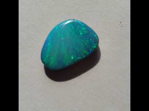 (2110) 5.66 cts Beautiful Peacock Pattern Free-Form Solid Black Opal!