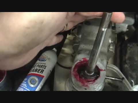 Testing and installing the gearshift antirattle spring and plunger in a Triumph TR3A