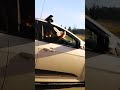 Holding A Condom Out Of The Car Window Shorts