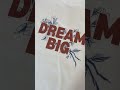 REMERA OVER ESTAMPADA DREAM BIG