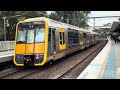 Lots of passenger and freight trains at Meadowbank station 