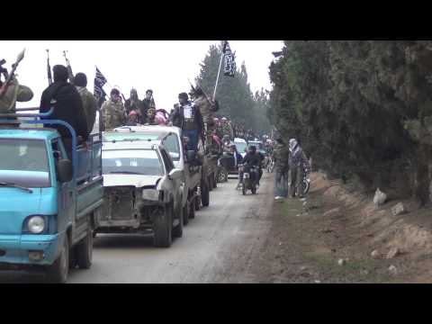 استعراض عسكري لفرقة الفاروق المستقلة بعد تشكيلها في القصير في حمص