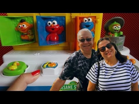 Sesame Street Singing Pop Up Pals Inc., Ernie, Elmo, Cookie Monster, & Oscar The Grouch Video