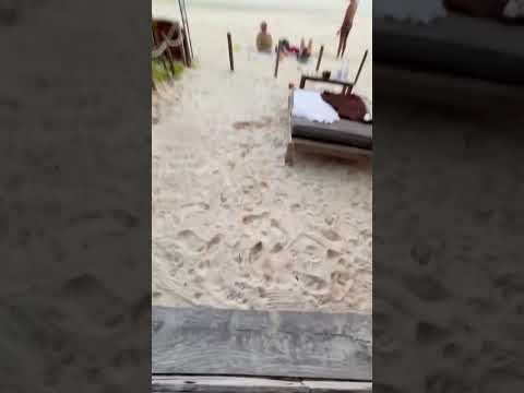 Dan Bilzerian with girl on beach