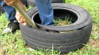 How to cut a tire and make it into a garden pot.wmv