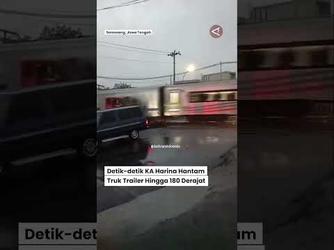 The terrifying moment a train collided with a trailer truck