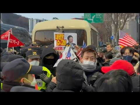 Yoon's supporters face off with police in South Korea | AFP
