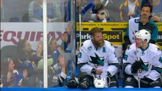 Thornton squirts water at & dances with young Blues fans