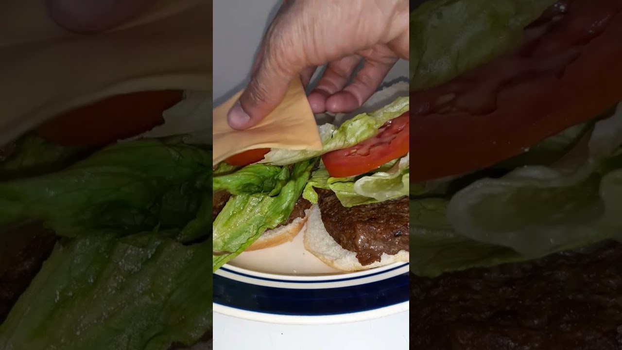 Hamburger With Cheese, Lettuce, And Tomato